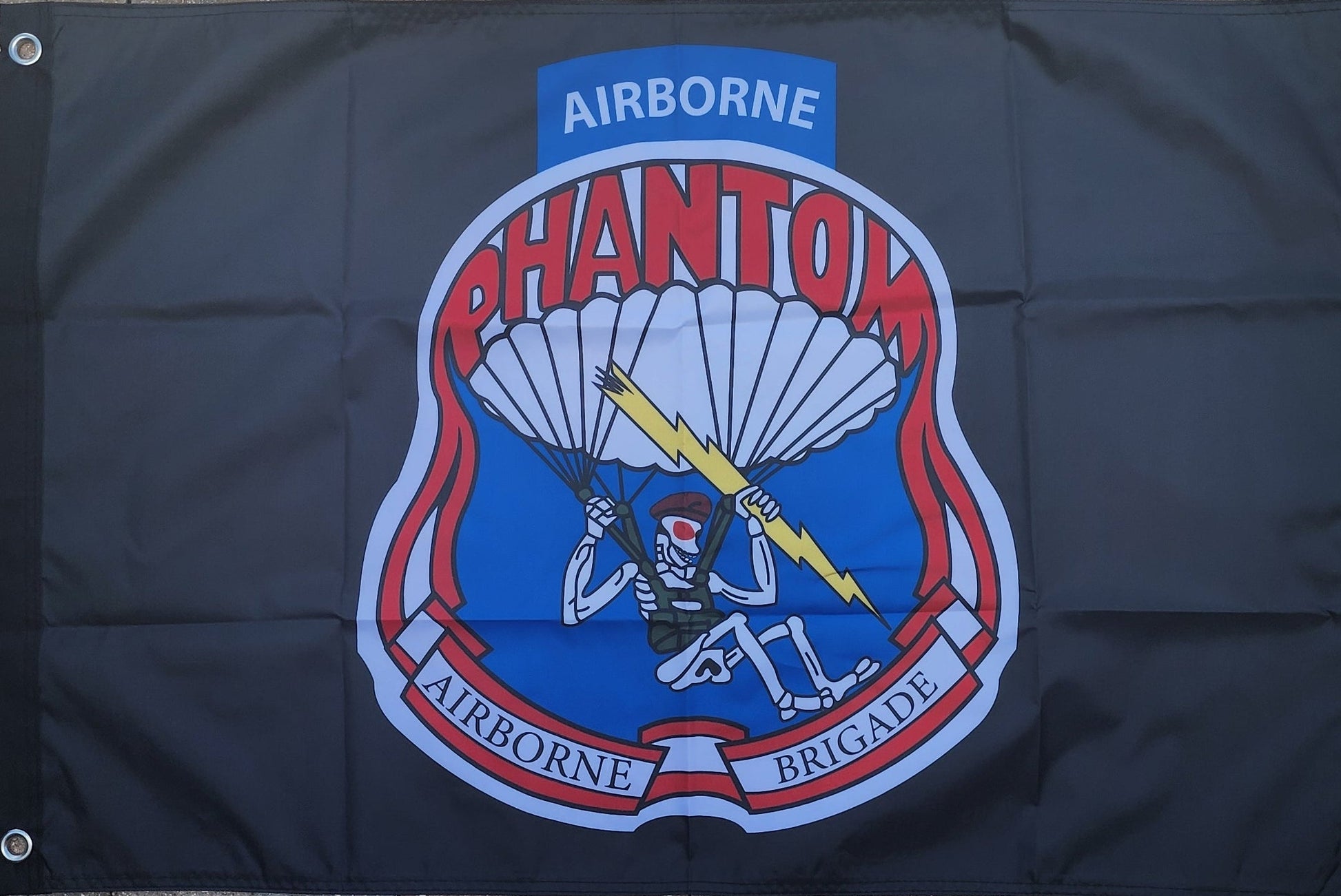 Airborne Phantom Brigade logo on a dark background