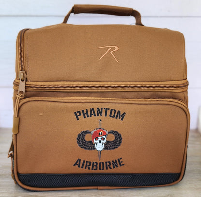 Brown bag with 'Phantom Airborne' text and logo on a wooden surface