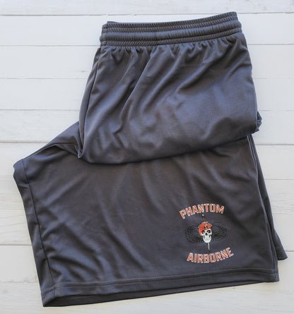 Black athletic shorts with a logo on 