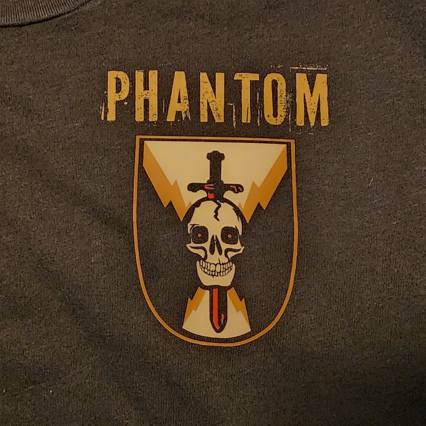 Logo with 'PHANTOM' text and skull design on a dark background